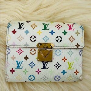 Aithentic Louis Vuitton Monogram Multicolore Koala Wallet in canvas and leather.